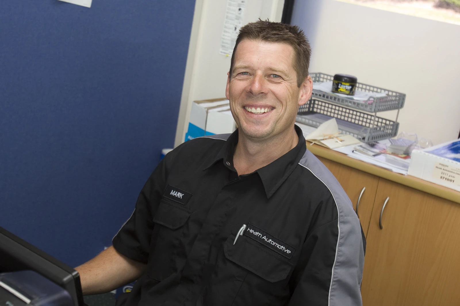 Mark at the Heath Automotive service desk