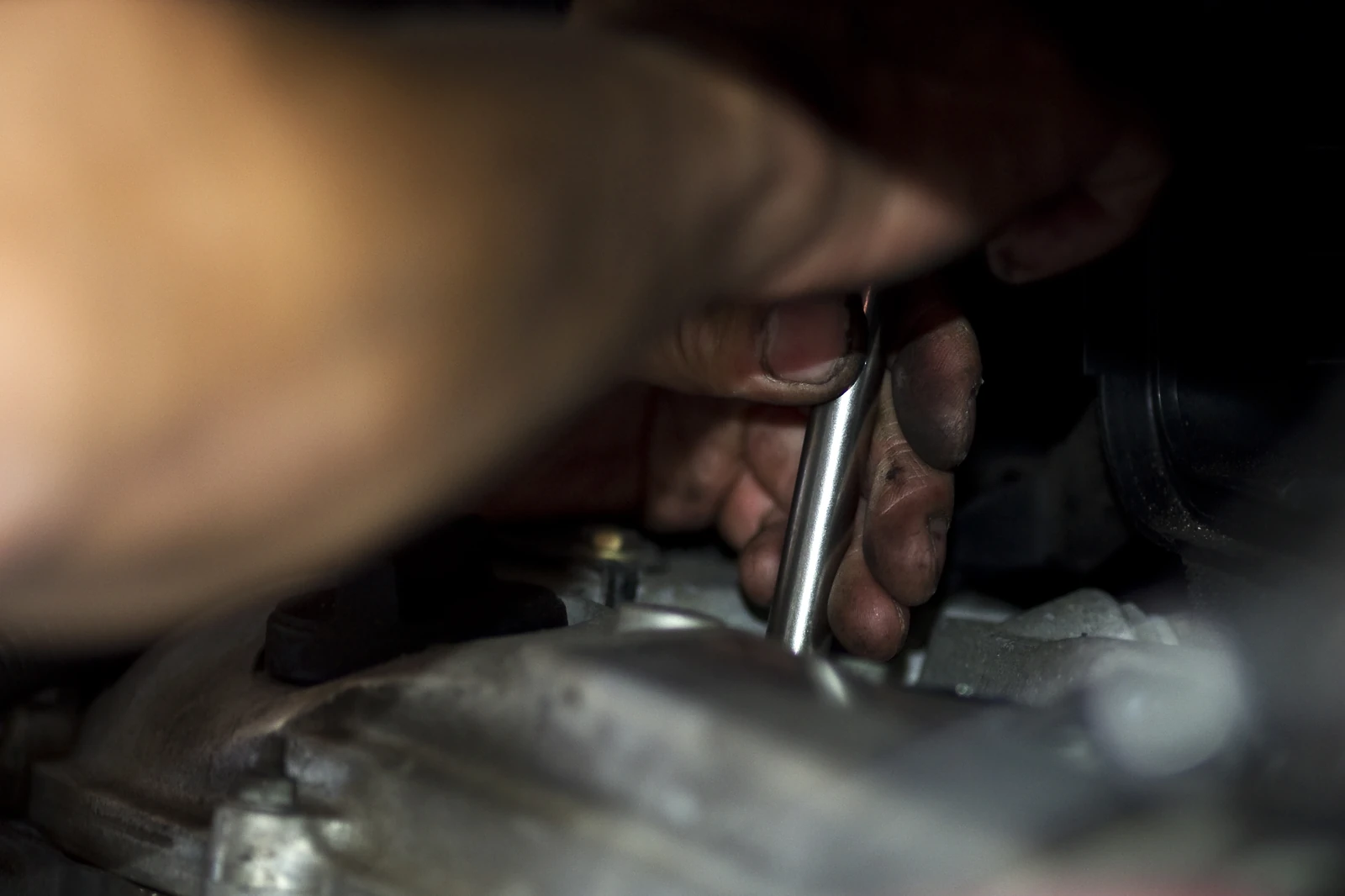 Hands at work in the Heath Automotive workshop